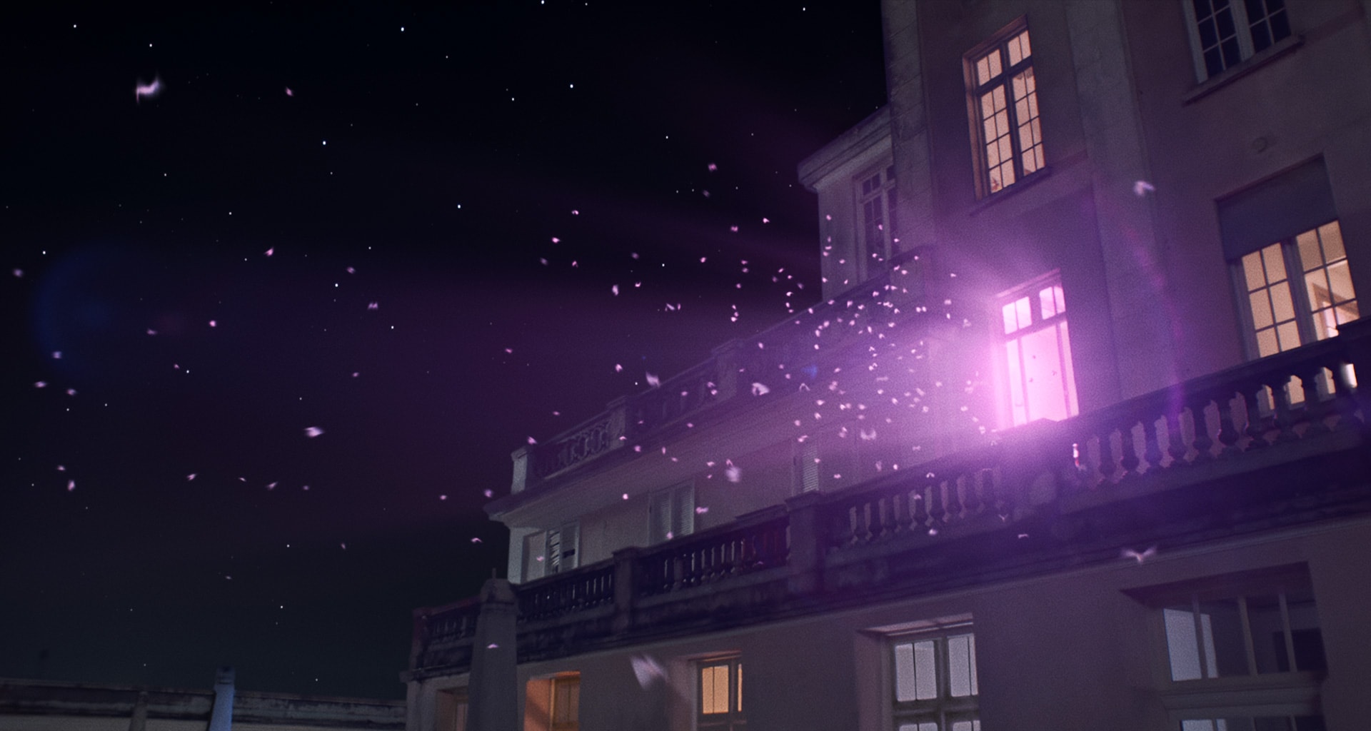 Moths flock across the night sky toward the top of a mansion. From the living room window, the camera cuts to a silhouette of a couple watching TV on the sofa. Bands of blue and
purple light sway onscreen.